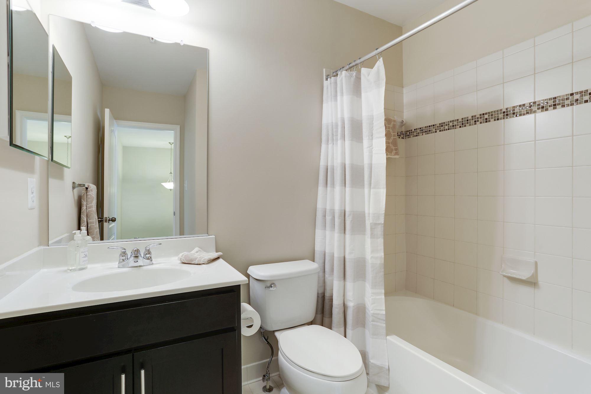 14405 Vedanta Way Silver Spring, MD 20906 - Photo 22 of 30 Spacious hall bath, upgraded ceramic tile