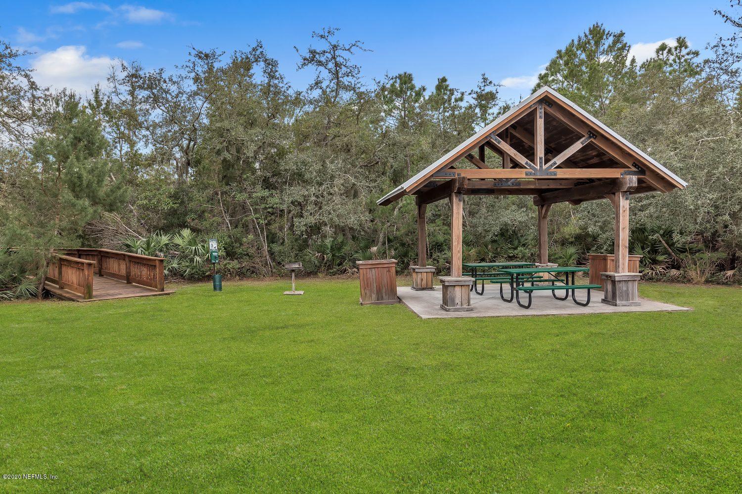 510 Modesto Drive St. Augustine, FL 32086 - Photo 31 of 38 a view of a house with backyard porch and sitting area