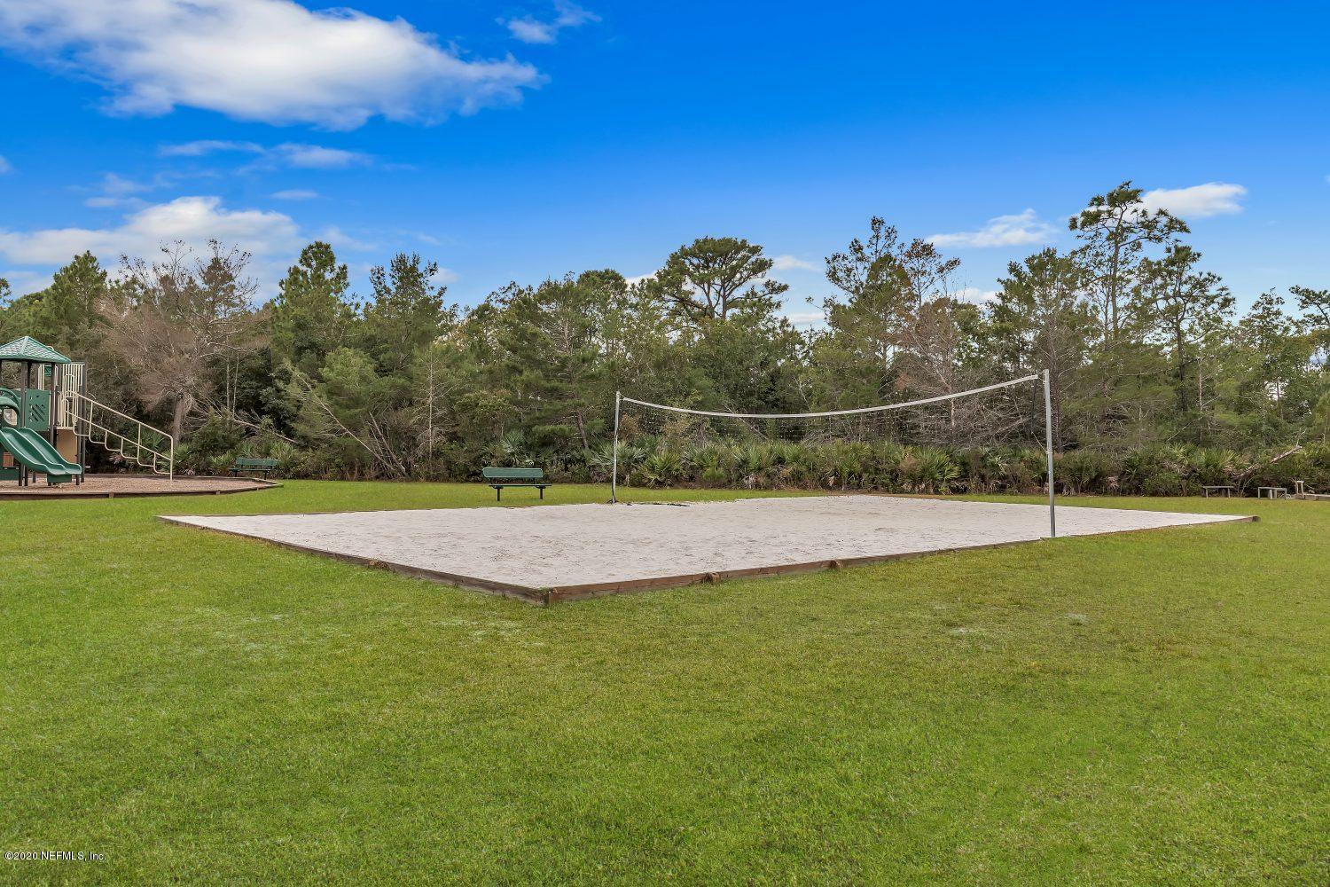 510 Modesto Drive St. Augustine, FL 32086 - Photo 36 of 38 a view of a outdoor space and a swimming pool