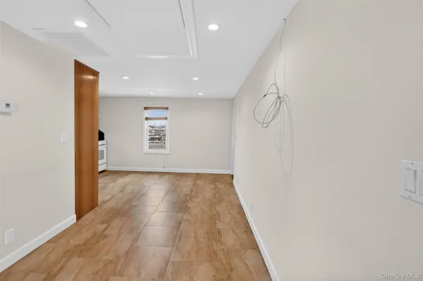 a view of livingroom with hardwood floor and window