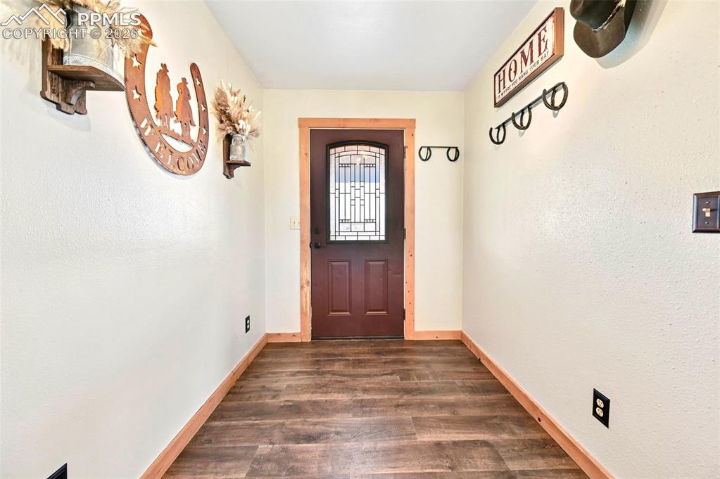 18560 Chelton Road Ramah, CO 80832 - Photo 3 of 34 a view of a hallway with entryway