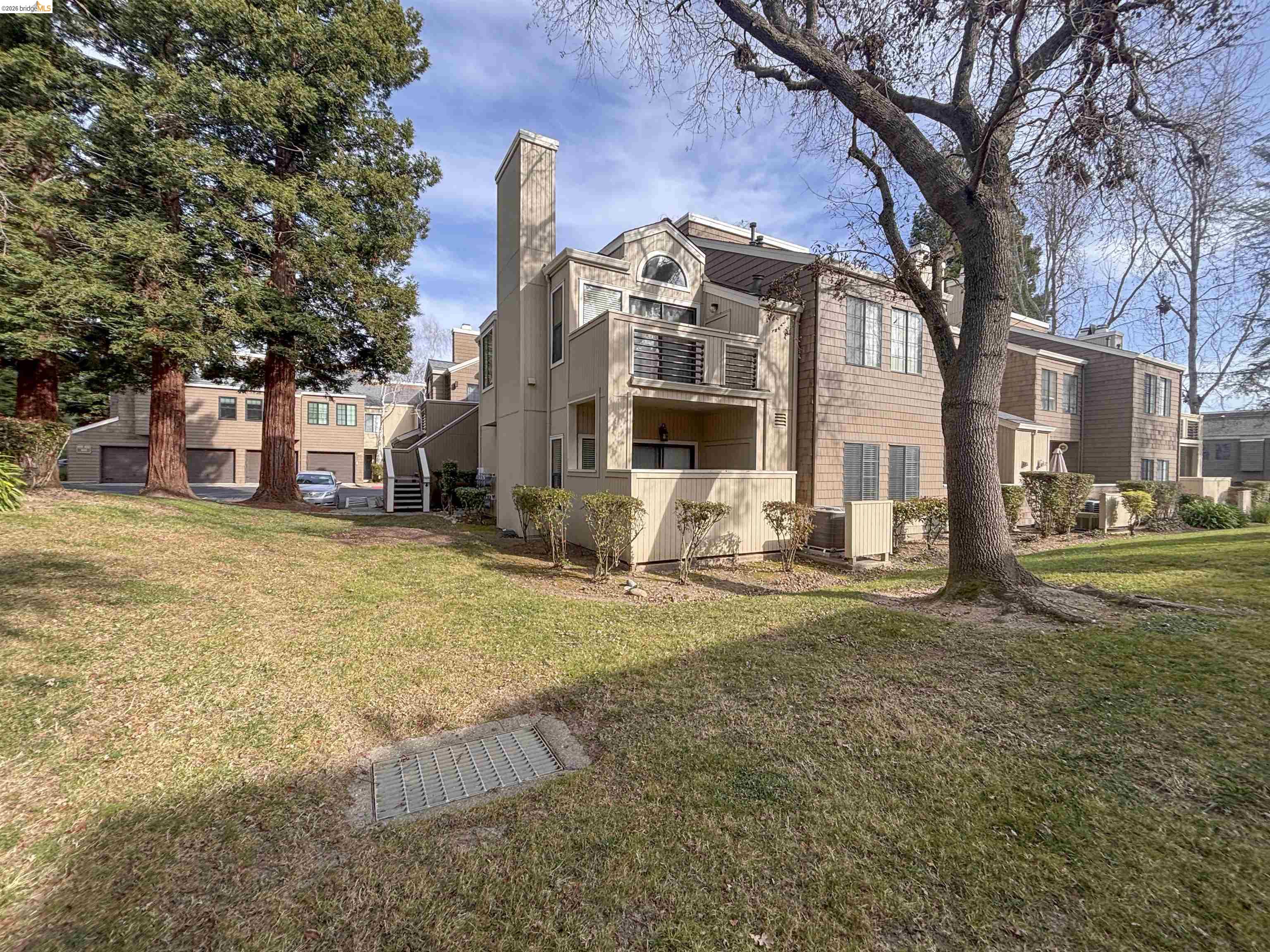 450 Pine Ridge Drive San Ramon, CA 94582 - Photo 3 of 18 a view of a street with houses