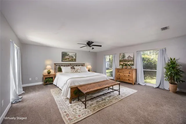 an aerial view of house with yard