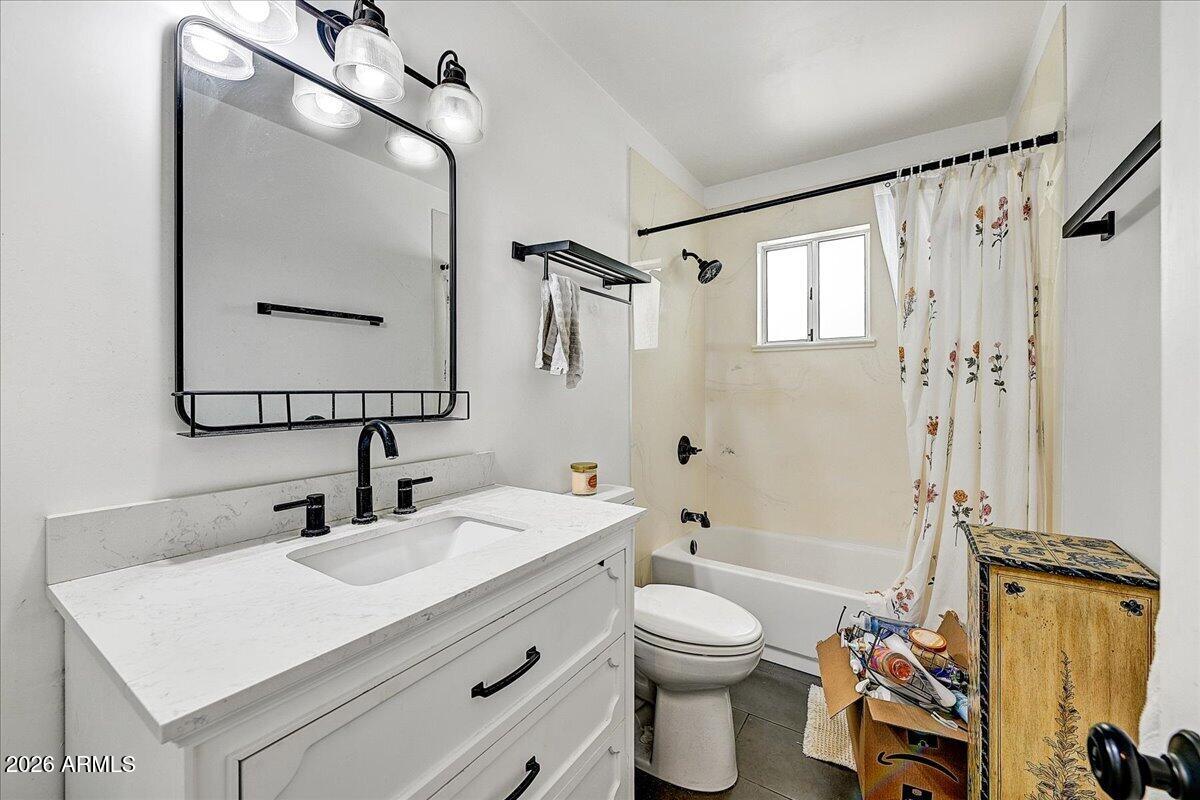 607 West 15th Street Tempe, AZ 85281 - Photo 20 of 29 a bathroom with a sink vanity granite toilet and shower