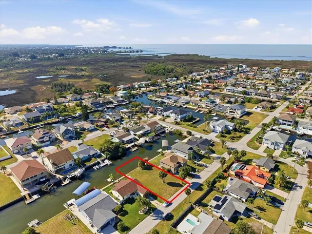 an aerial view of residential building with parking space