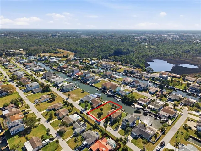 an aerial view of a city with lots of residential buildings