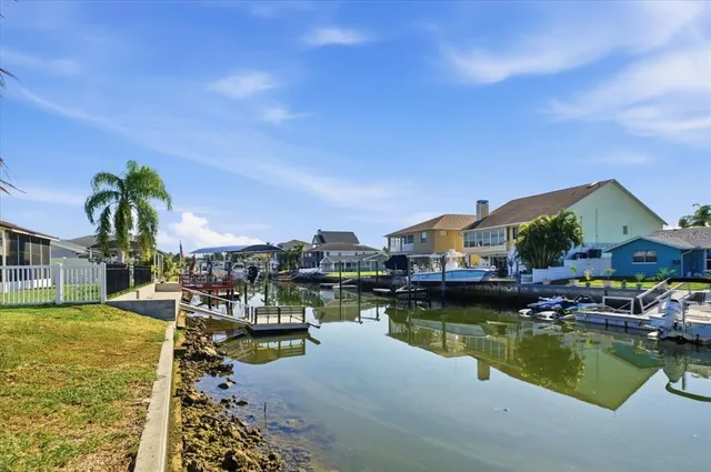 a swimming pool view with a lake view