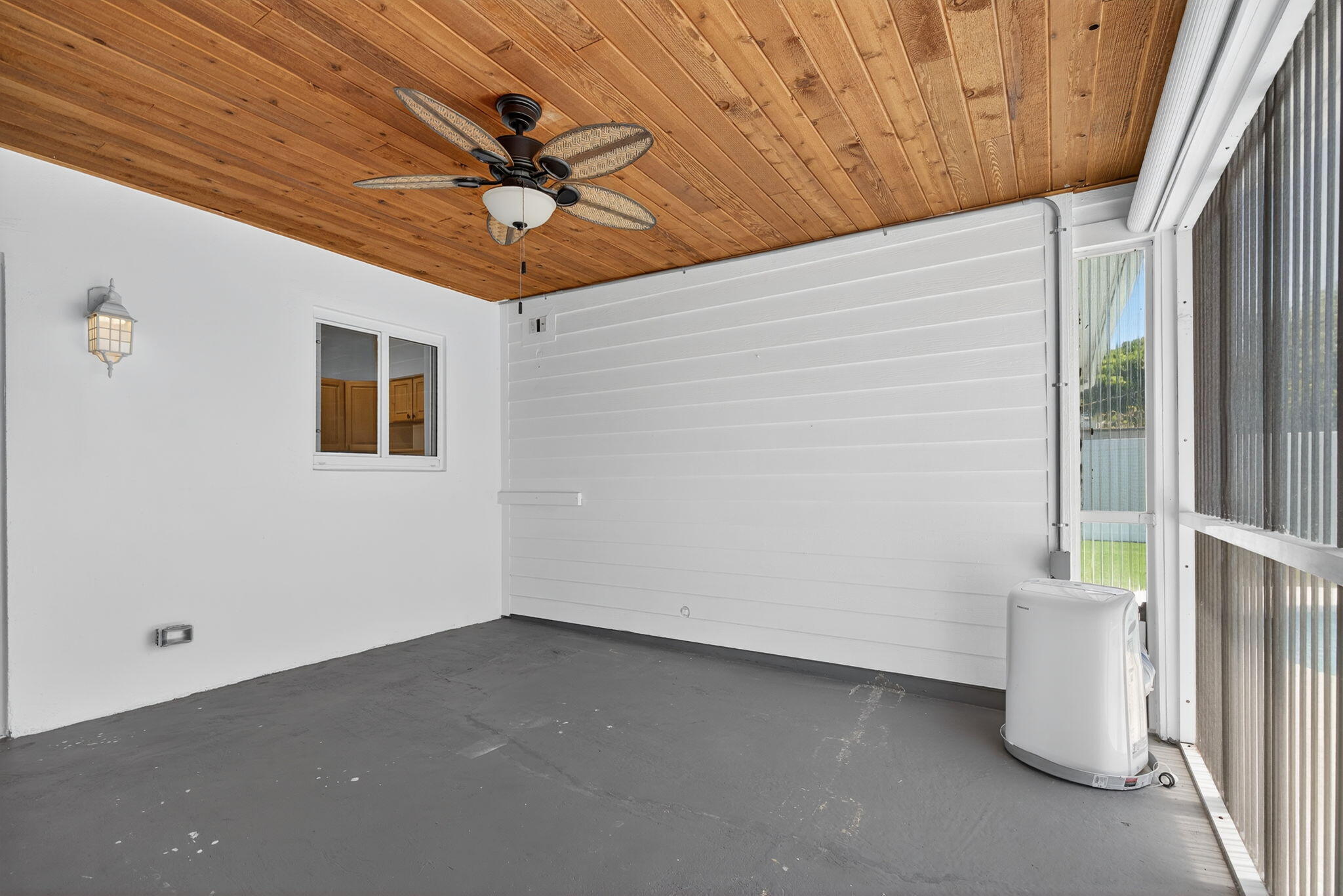 516 East Whitney Drive Jupiter, FL 33458 - Photo 13 of 63 Covered Back Patio