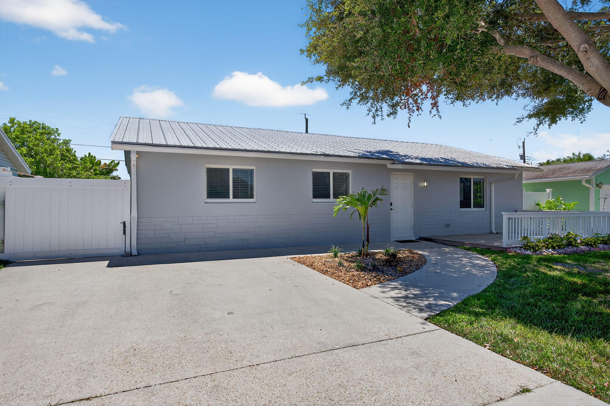 516 East Whitney Drive Jupiter, FL 33458 - Photo 7 of 63 Front of Home