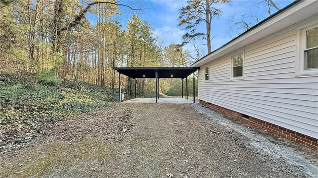 a view of a back yard of a house