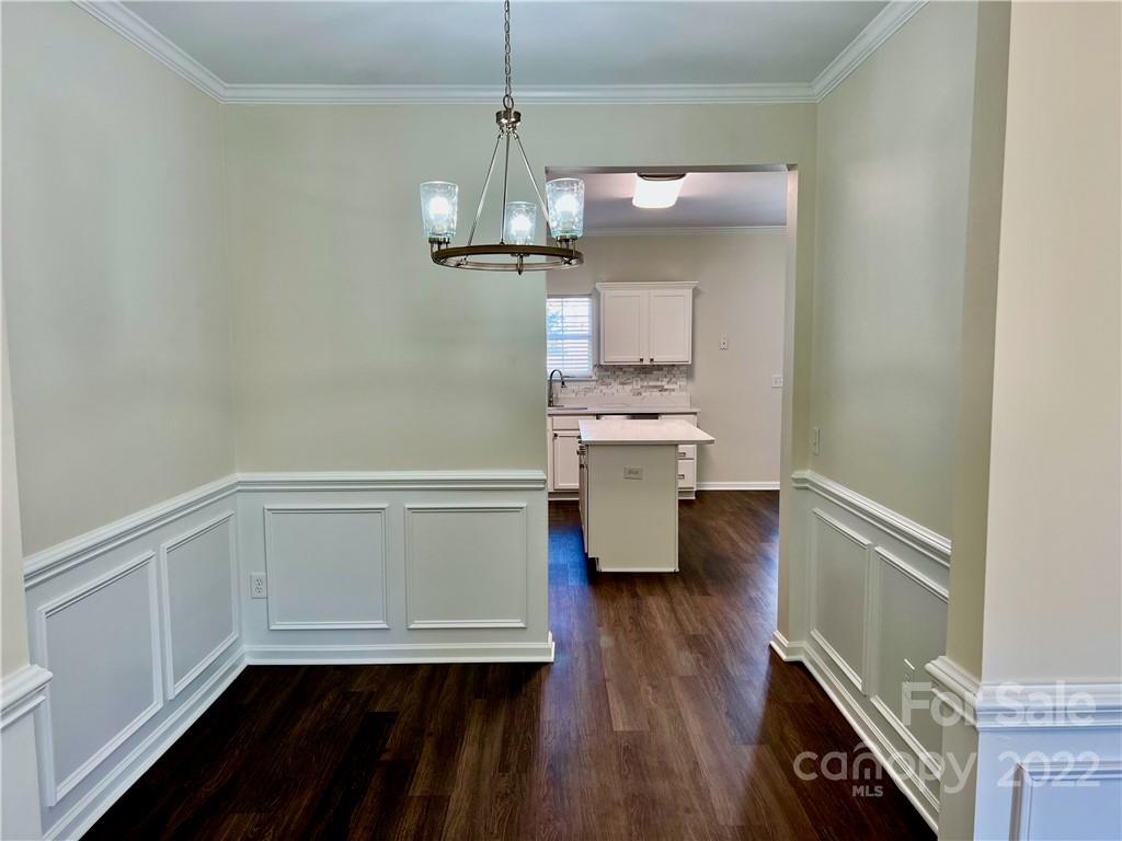 841 Dillard Road Rock Hill, SC 29730 - Photo 5 of 20 a view of a room with wooden floor a sink and a window