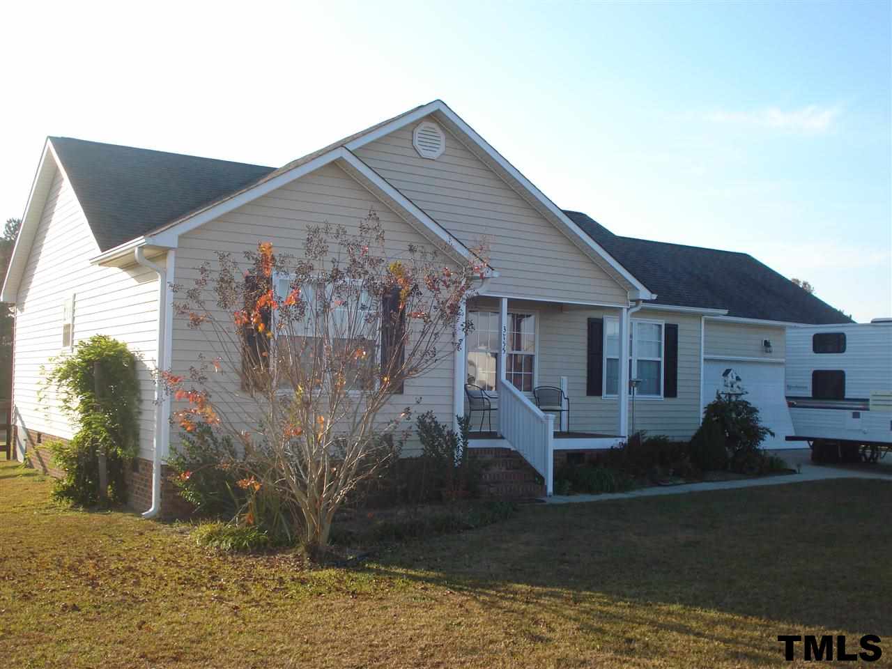 3755 Old Stage Road North Angier, NC 27501 - Photo 1 of 15 a view of a house with backyard and garden