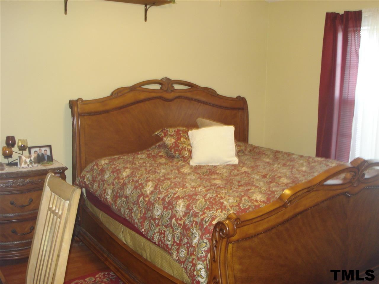 3755 Old Stage Road North Angier, NC 27501 - Photo 11 of 15 a bedroom with a bed and dresser