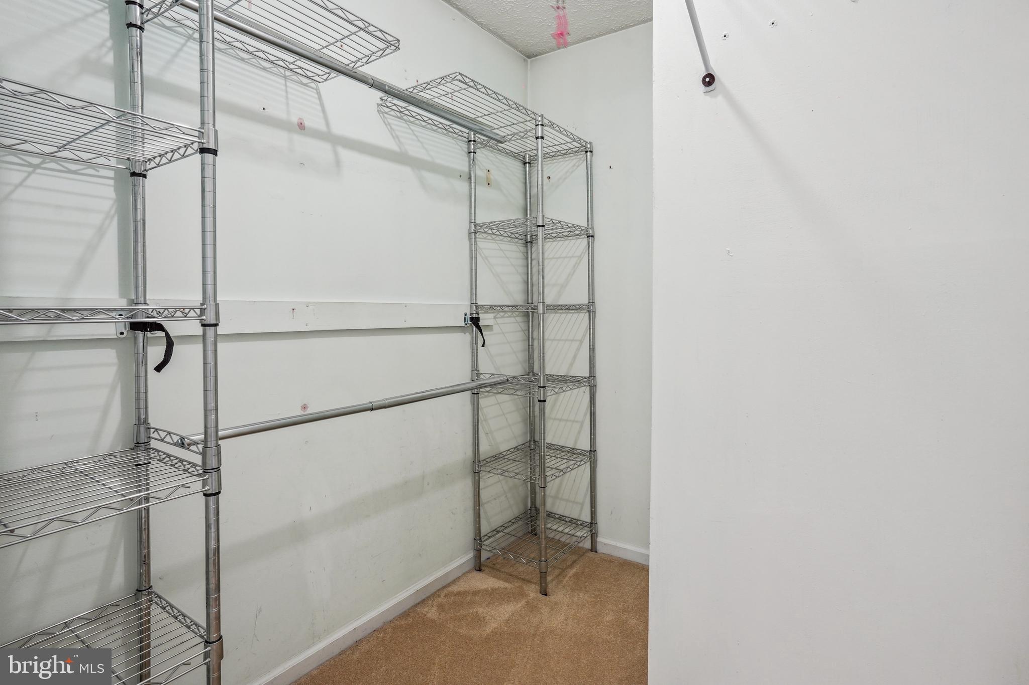 6377 Generals Court Centreville, VA 20121 - Photo 29 of 32 a bathroom with a shower