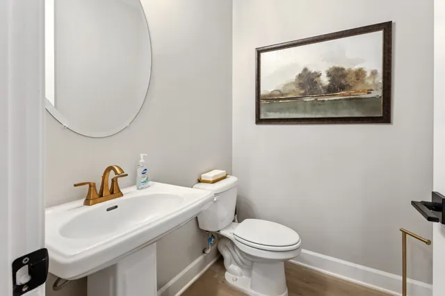 a bathroom with a toilet and a sink