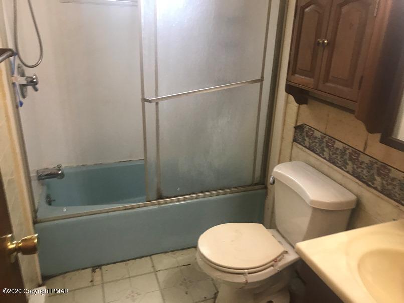1186 Mattioli Road Bartonsville, PA 18321 - Photo 8 of 10 a bathroom with a toilet and a shower