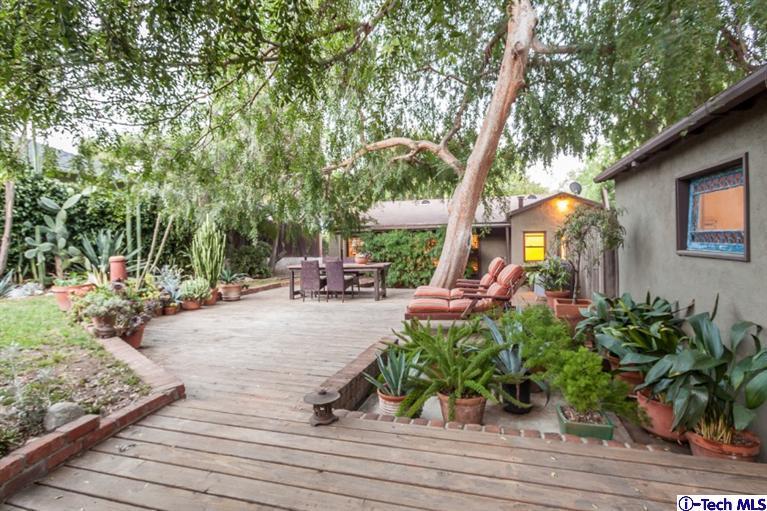 525 Lakeview Road Pasadena, CA 91105 - Photo 20 of 23 a view of a house with sitting area and garden