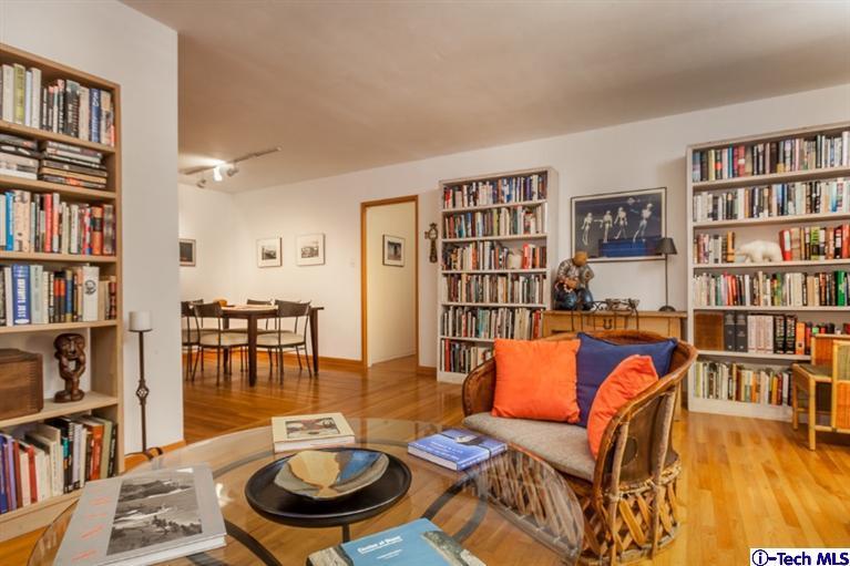 525 Lakeview Road Pasadena, CA 91105 - Photo 4 of 23 a living room with furniture and a book shelf
