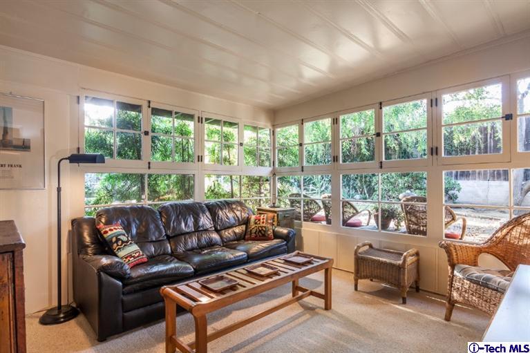 525 Lakeview Road Pasadena, CA 91105 - Photo 6 of 23 a living room with furniture and a large window
