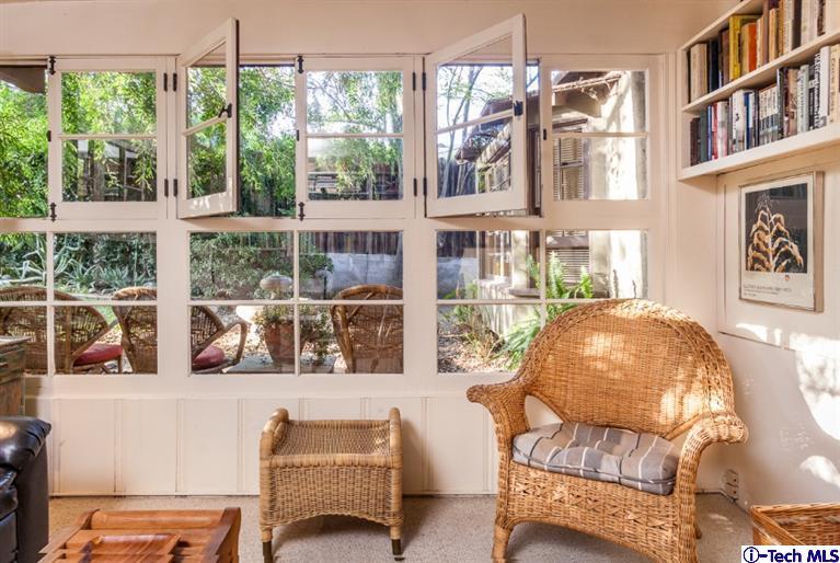 525 Lakeview Road Pasadena, CA 91105 - Photo 7 of 23 a living room filled with furniture and a large window