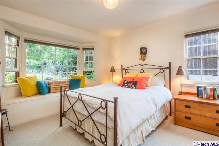 525 Lakeview Road Pasadena, CA 91105 - Photo 8 of 23 a bedroom with a bed and a window