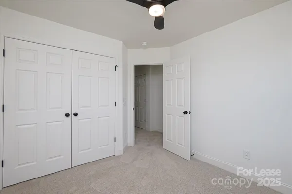 a view of a room with an empty space