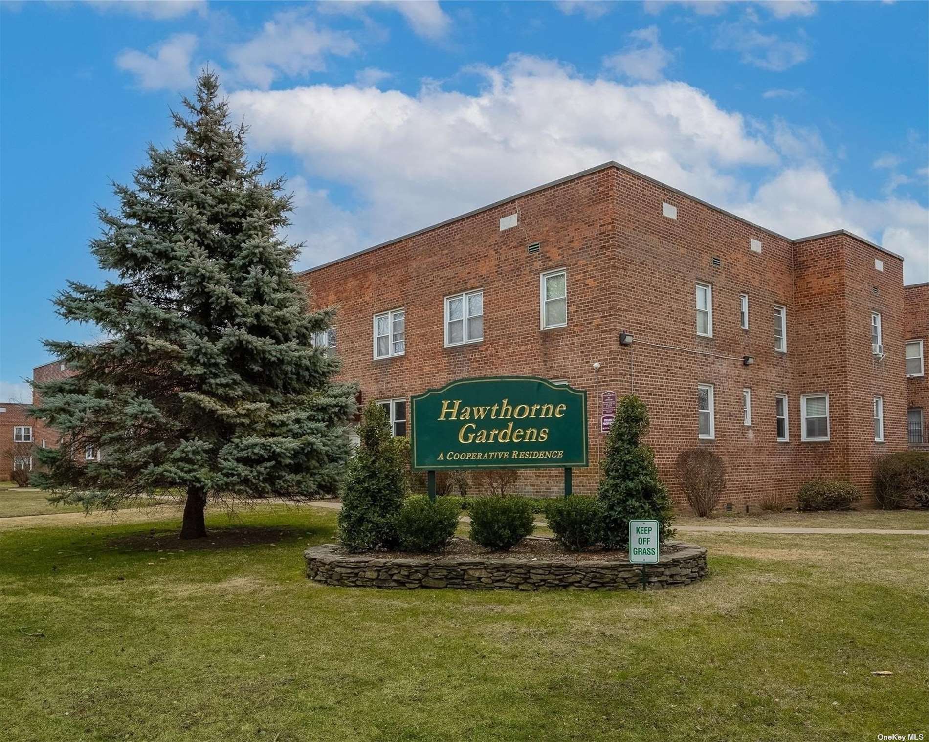 a sign board on the side of a building