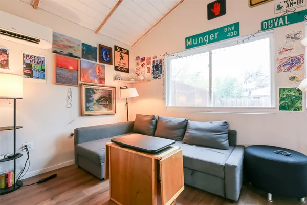 a living room with furniture and a window