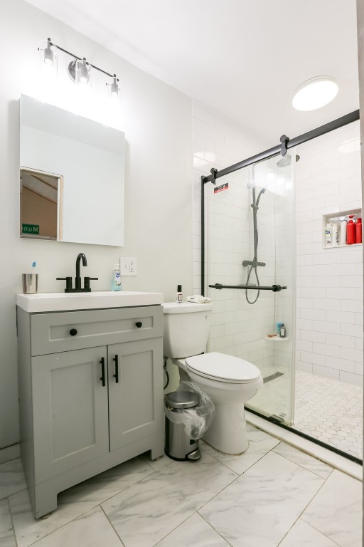 308 East 32nd Street, Unit B Austin, TX 78705 - Photo 21 of 27 a bathroom with a sink toilet and shower