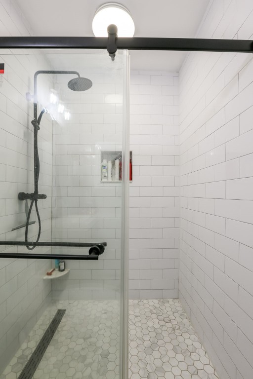 308 East 32nd Street, Unit B Austin, TX 78705 - Photo 22 of 27 a bathroom with a shower