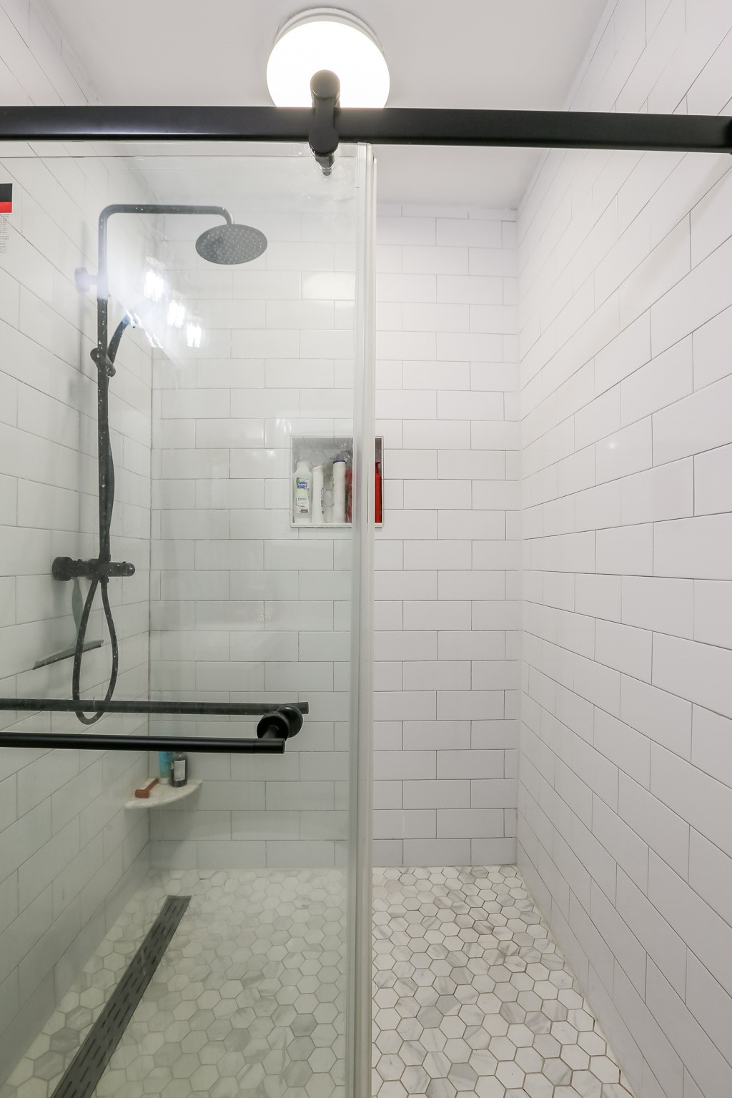308 East 32nd Street, Unit B Austin, TX 78705 - Photo 22 of 27 a bathroom with a shower