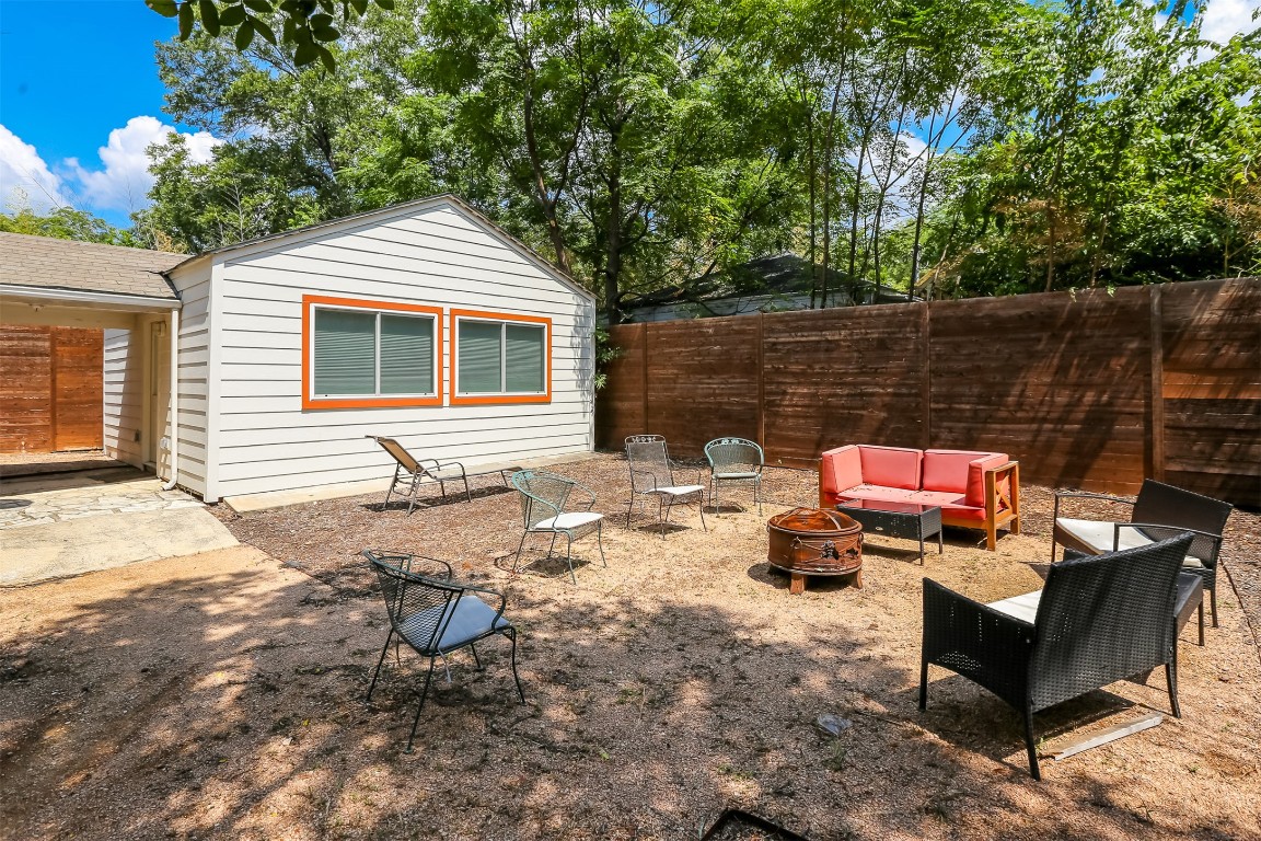 308 East 32nd Street, Unit B Austin, TX 78705 - Photo 6 of 27 a backyard of a house with seating space
