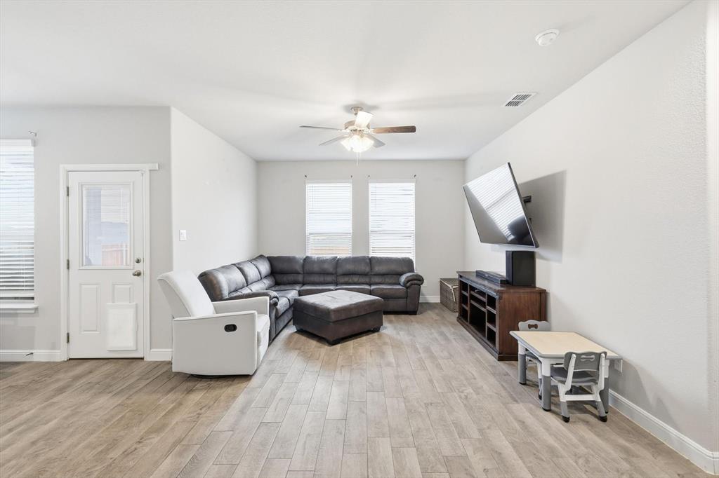 1420 Pleasanton Road Cleburne, TX 76033 - Photo 19 of 39 a living room with furniture and a large window