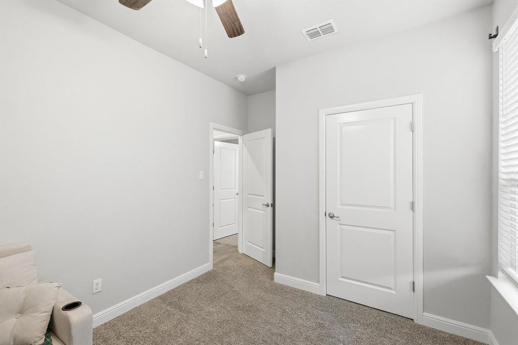 1420 Pleasanton Road Cleburne, TX 76033 - Photo 30 of 39 a view of a livingroom with wooden floor