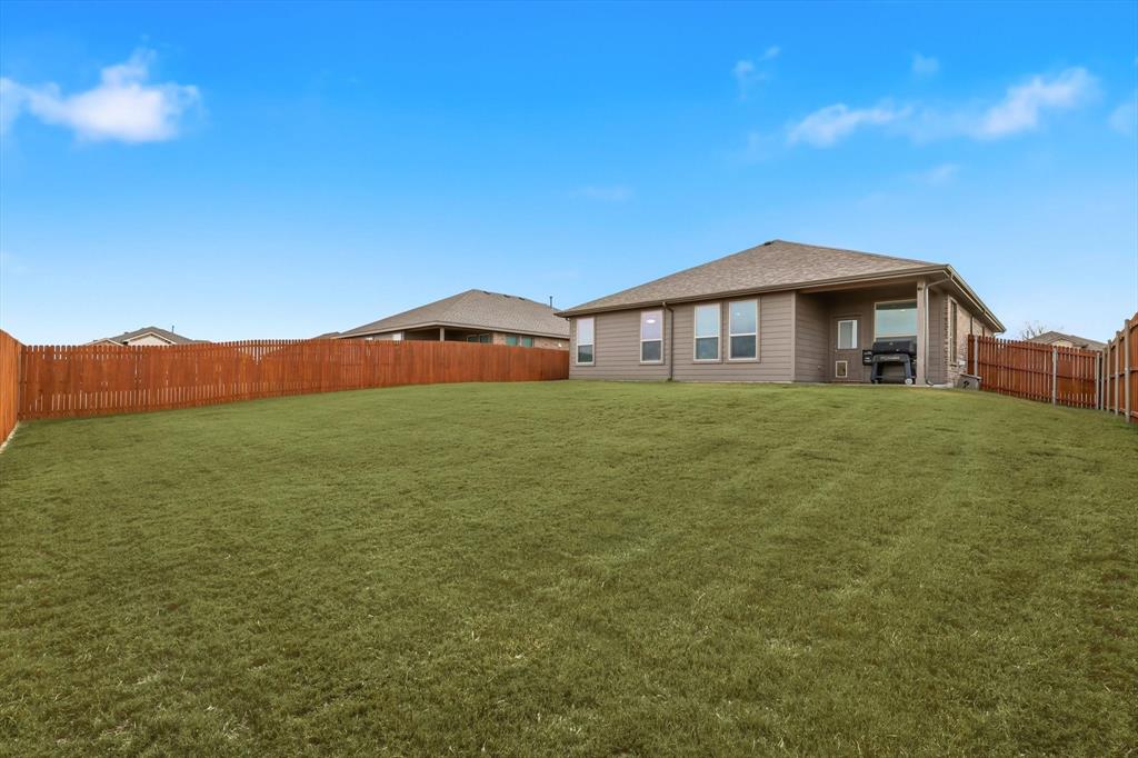 1420 Pleasanton Road Cleburne, TX 76033 - Photo 36 of 39 a house view with a garden space