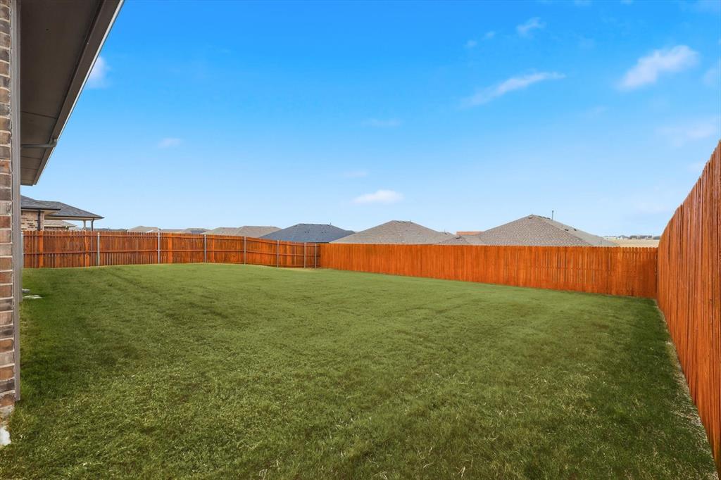 1420 Pleasanton Road Cleburne, TX 76033 - Photo 38 of 39 a view of an outdoor space and a yard