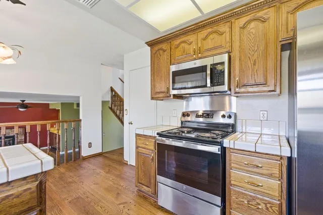 a view of an entryway with wooden floor
