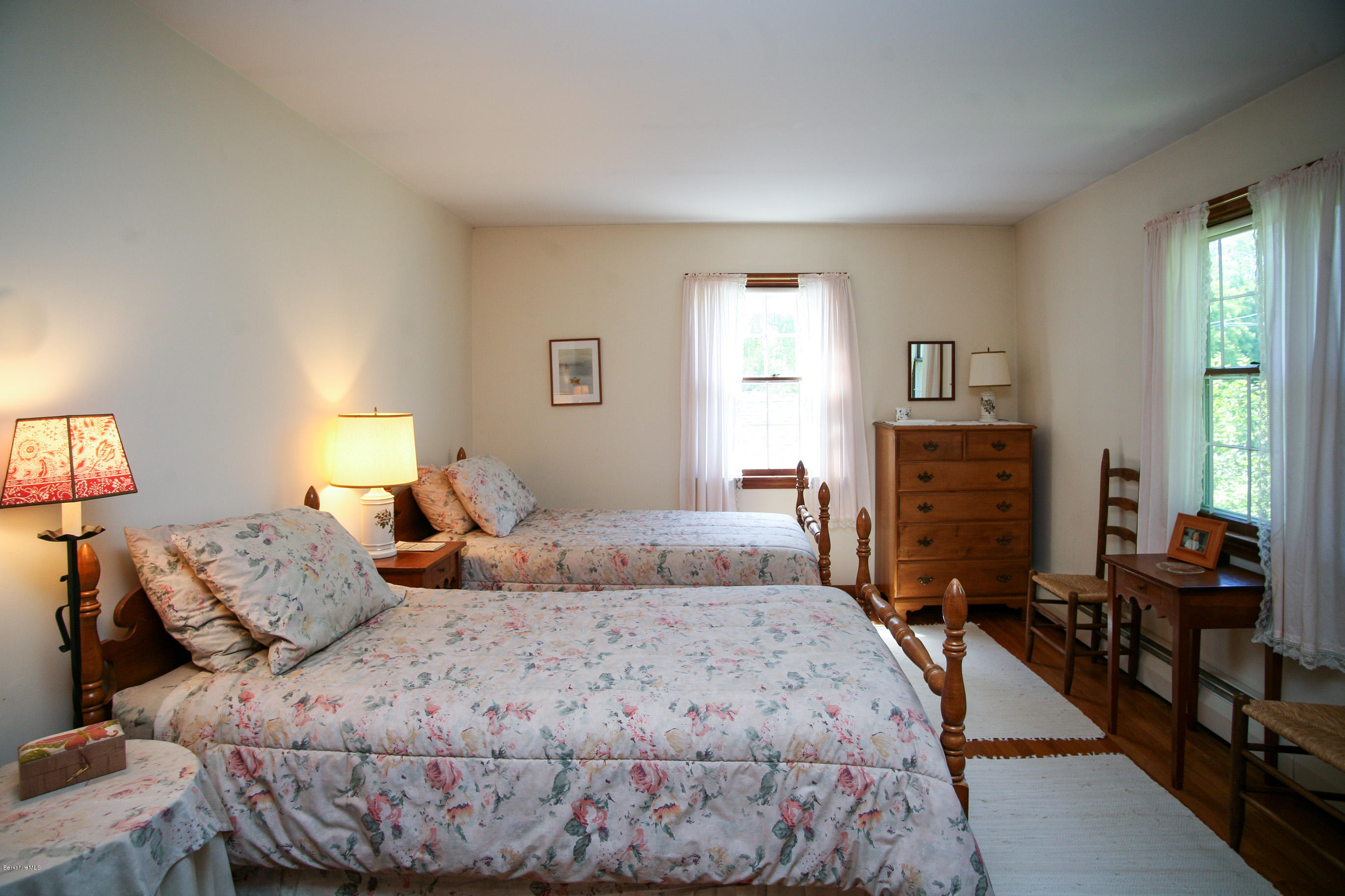6 Interlaken Cross Road Stockbridge, MA 01262 - Photo 13 of 20 a bedroom with a bed and wooden floor