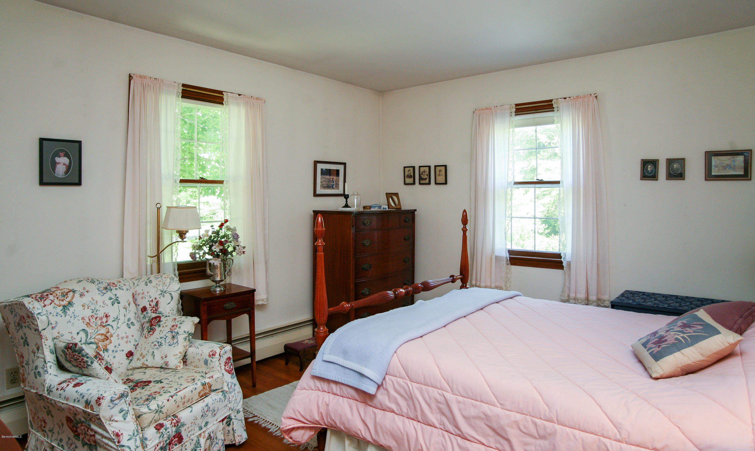 6 Interlaken Cross Road Stockbridge, MA 01262 - Photo 15 of 20 a bedroom with a bed and wooden floor