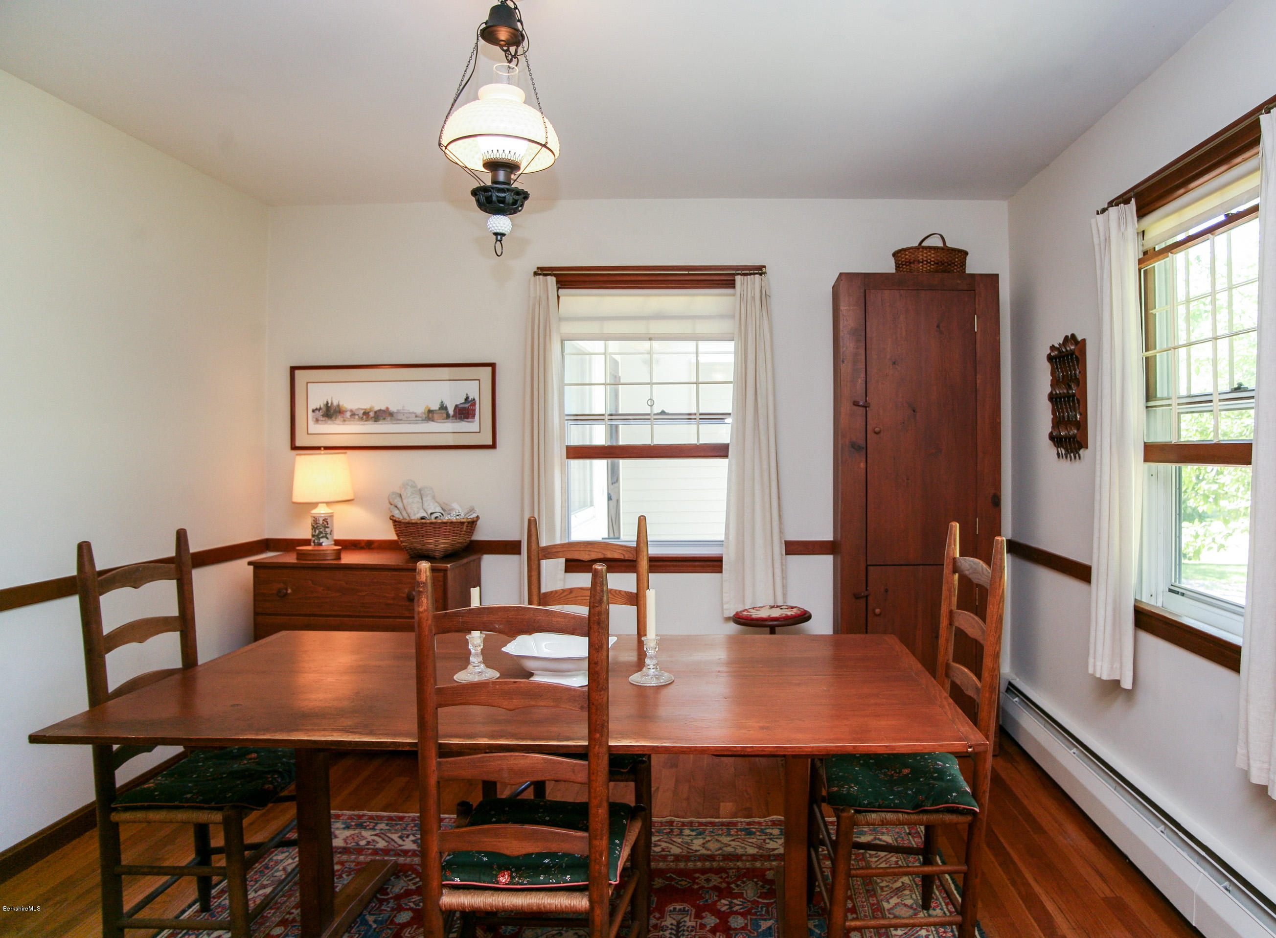 6 Interlaken Cross Road Stockbridge, MA 01262 - Photo 4 of 20 a view of a dining room with furniture window and wooden floor