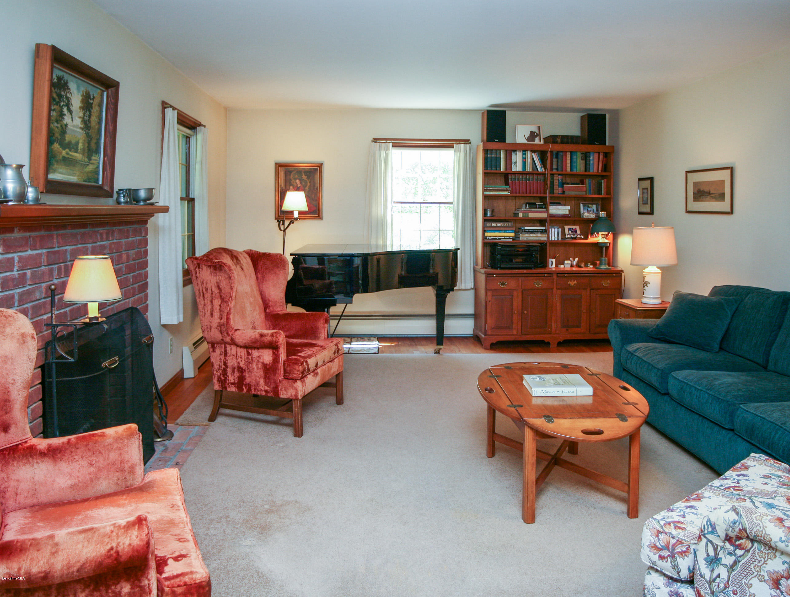 6 Interlaken Cross Road Stockbridge, MA 01262 - Photo 6 of 20 a living room with furniture a rug and a window