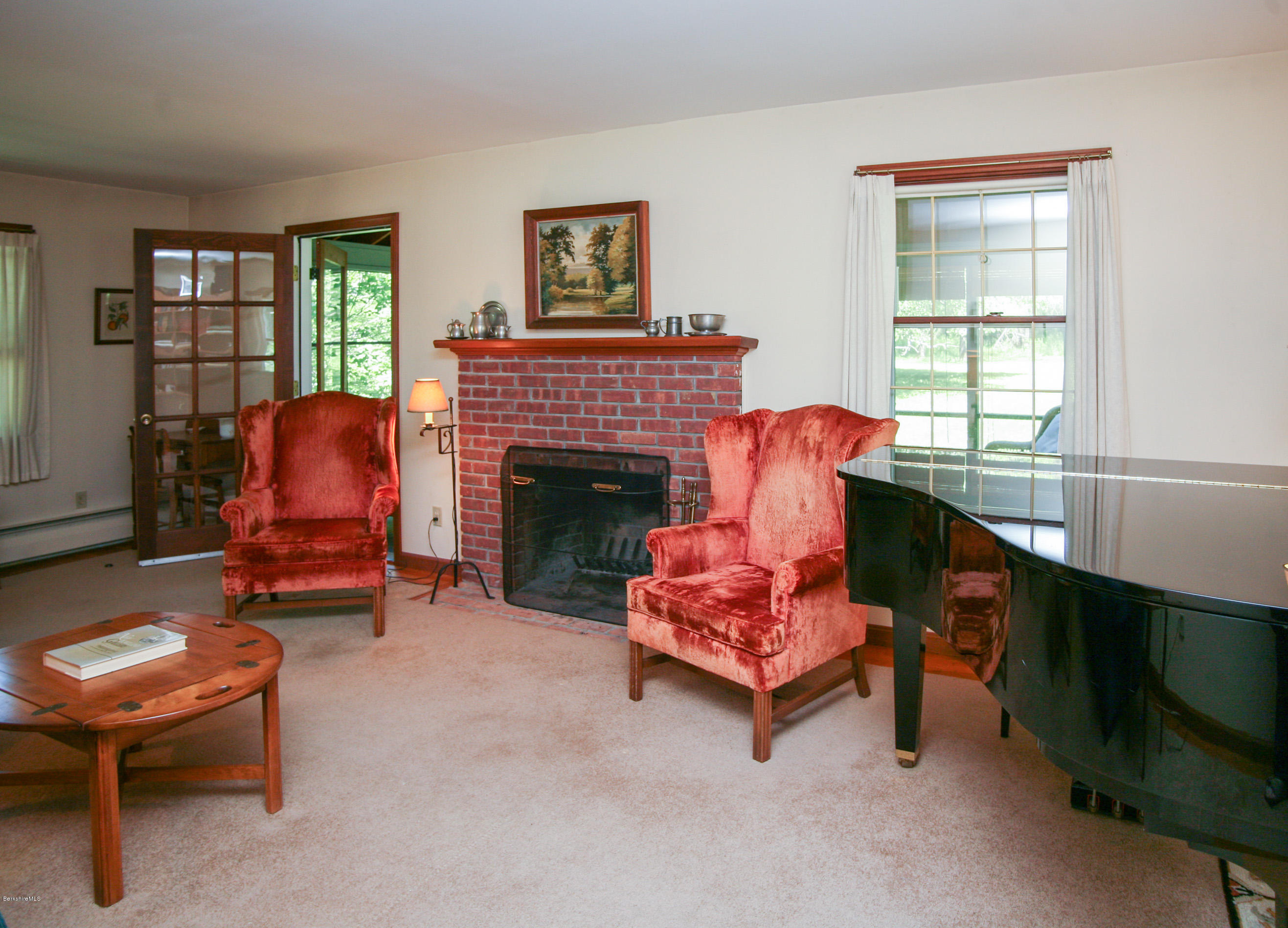 6 Interlaken Cross Road Stockbridge, MA 01262 - Photo 8 of 20 a living room with furniture and a fireplace