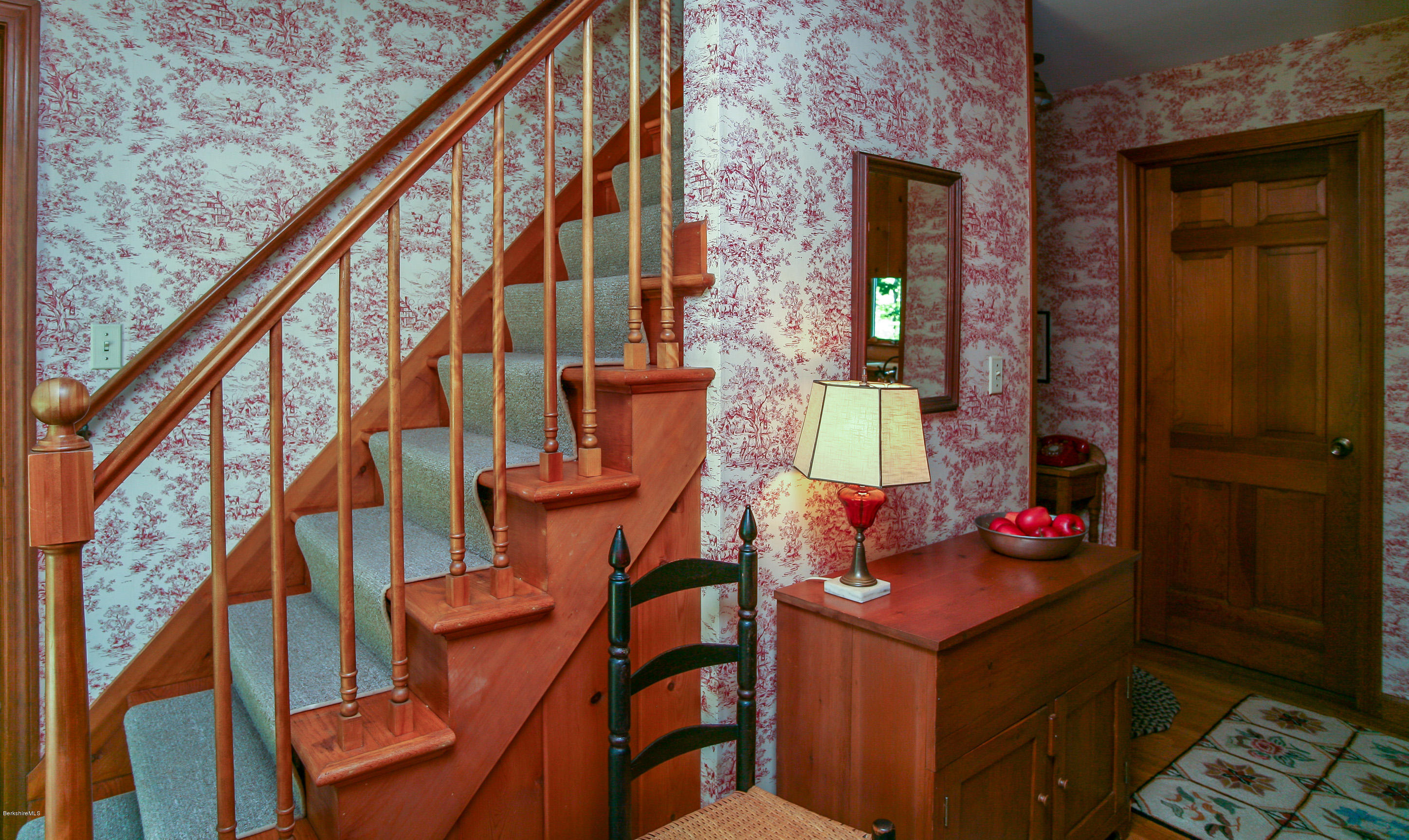 6 Interlaken Cross Road Stockbridge, MA 01262 - Photo 10 of 20 a view of an chairs and tables in the balcony