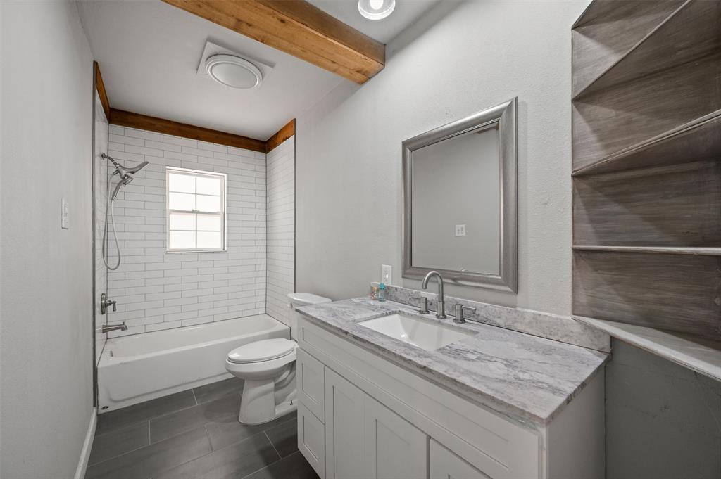 41 Kelsey Road Denison, TX 75021 - Photo 27 of 32 Guest bathroom with new vanity.