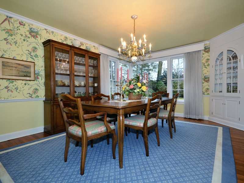 21 Cross Road Darien, CT 06820 - Photo 12 of 25 a view of a dining room with furniture window and wooden floor