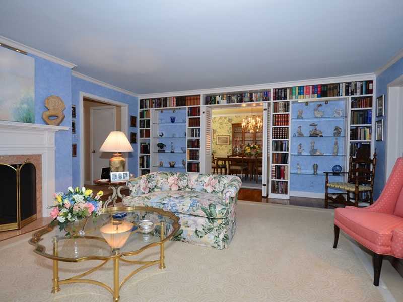 21 Cross Road Darien, CT 06820 - Photo 7 of 25 a living room with furniture and a fireplace