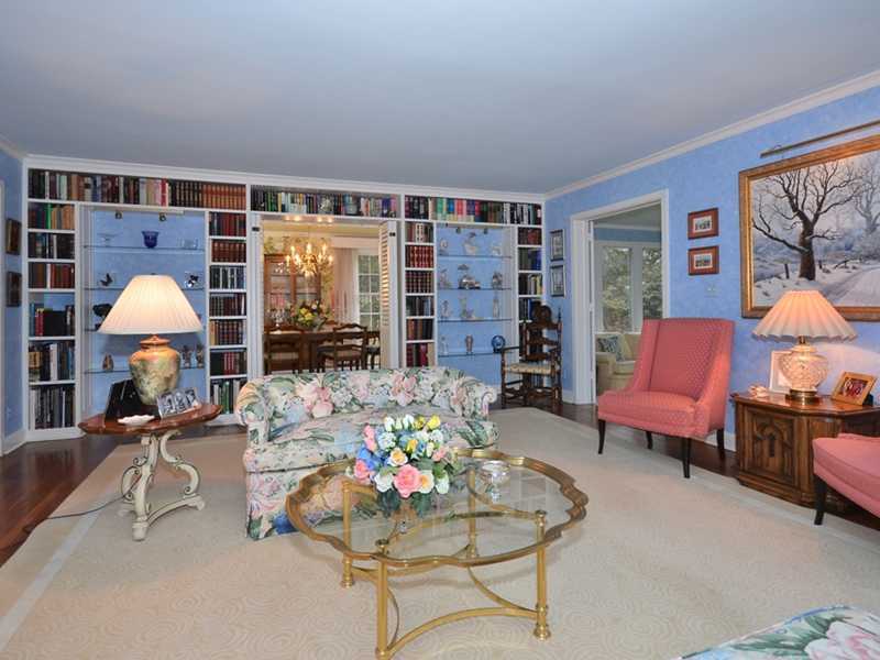 21 Cross Road Darien, CT 06820 - Photo 8 of 25 a living room with furniture and a large window