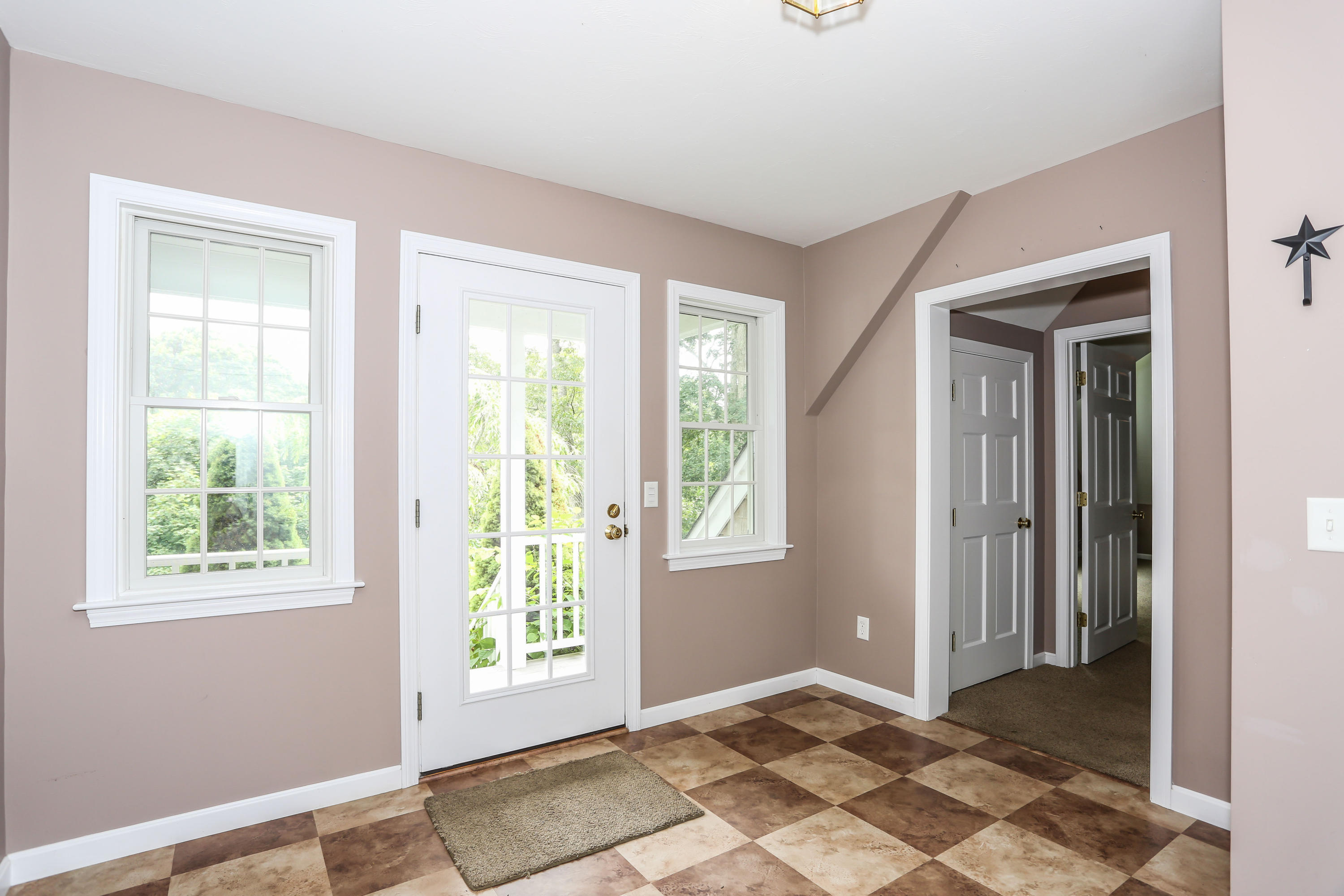 65 Trinity Place Centerville, MA 02632 - Photo 16 of 34 a view of an empty room with window