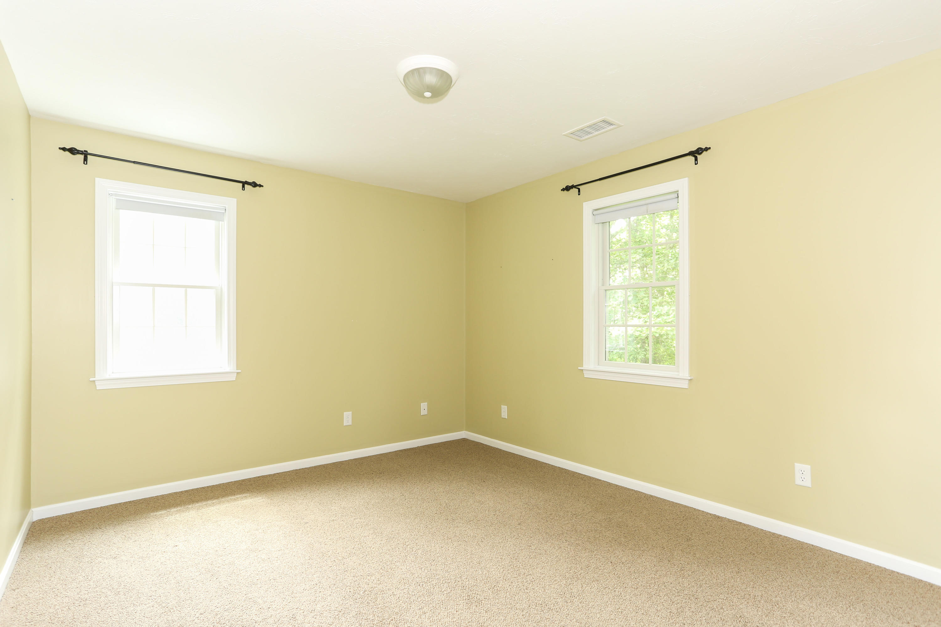 65 Trinity Place Centerville, MA 02632 - Photo 19 of 34 a view of an empty room with a window