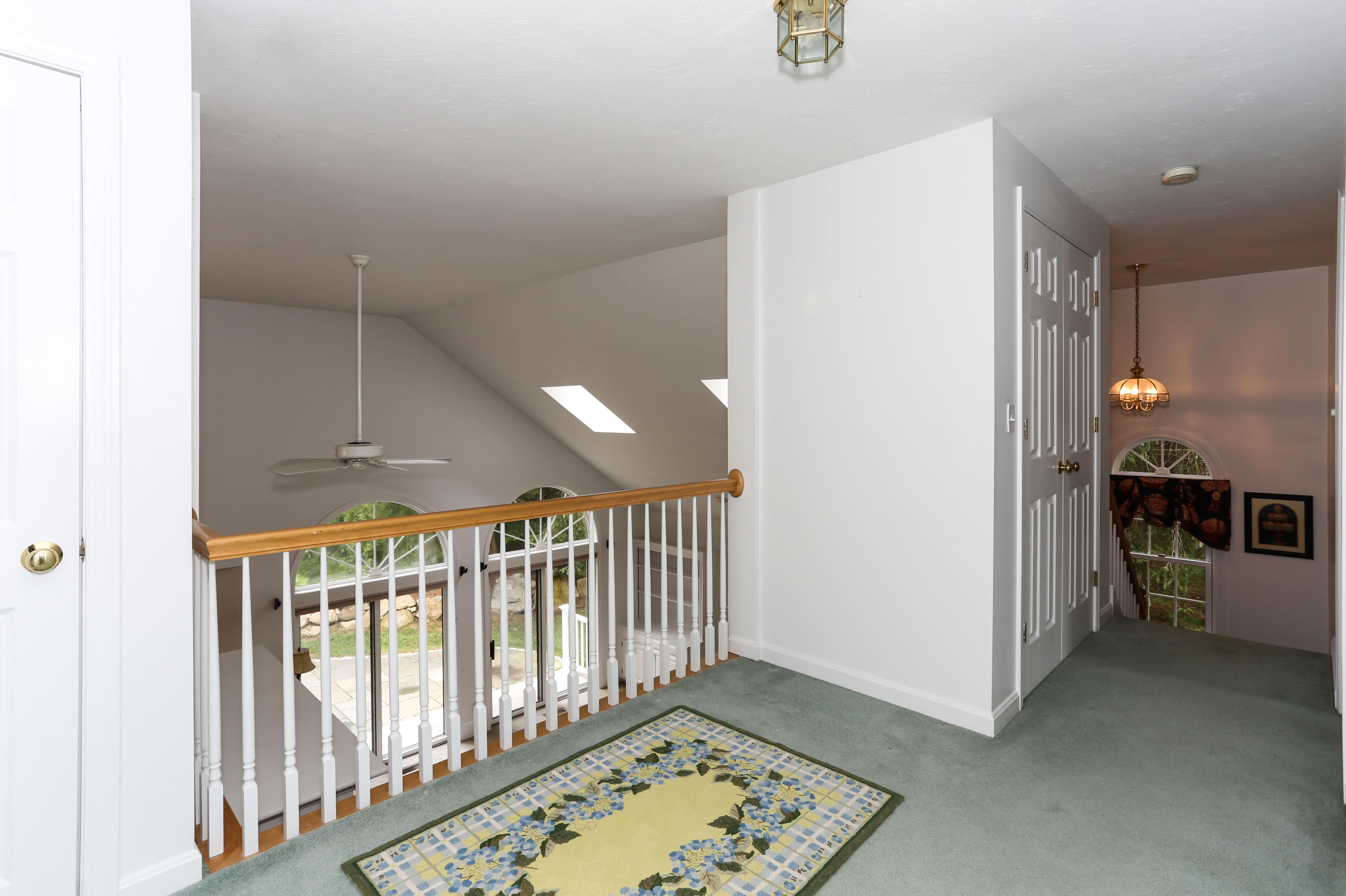 65 Trinity Place Centerville, MA 02632 - Photo 21 of 34 a view of entryway with wooden floor